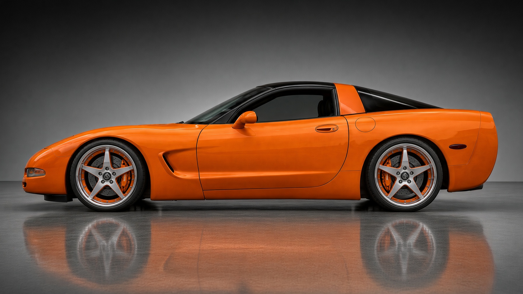 Orange JB Chevrolet Corvette C5 in side profile